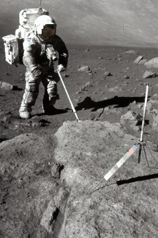 An Apollo 17 astronaut used a metal pole to collect a sample on the moon's surface in 1972.