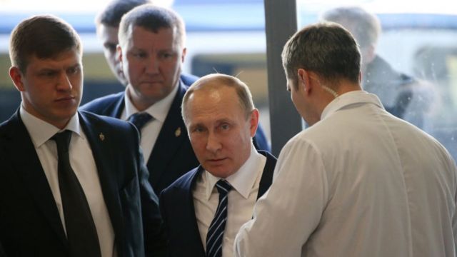 Vladimir Putin with his bodyguards