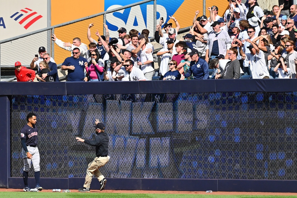 Fans threw beer and trash on the field at the end of the Yankees' win over the Guardians on Saturday.