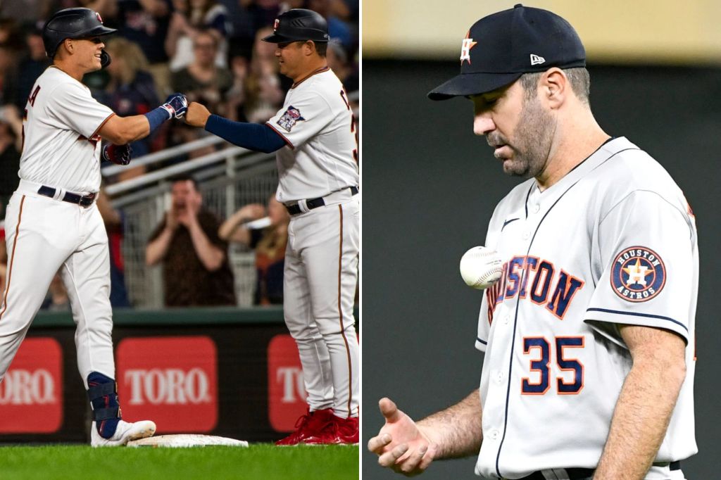 Former Yankee Geo Orchila celebrates with the Twins' first primary coach after breaking Justin Verlander's no-hitter attempt (right).