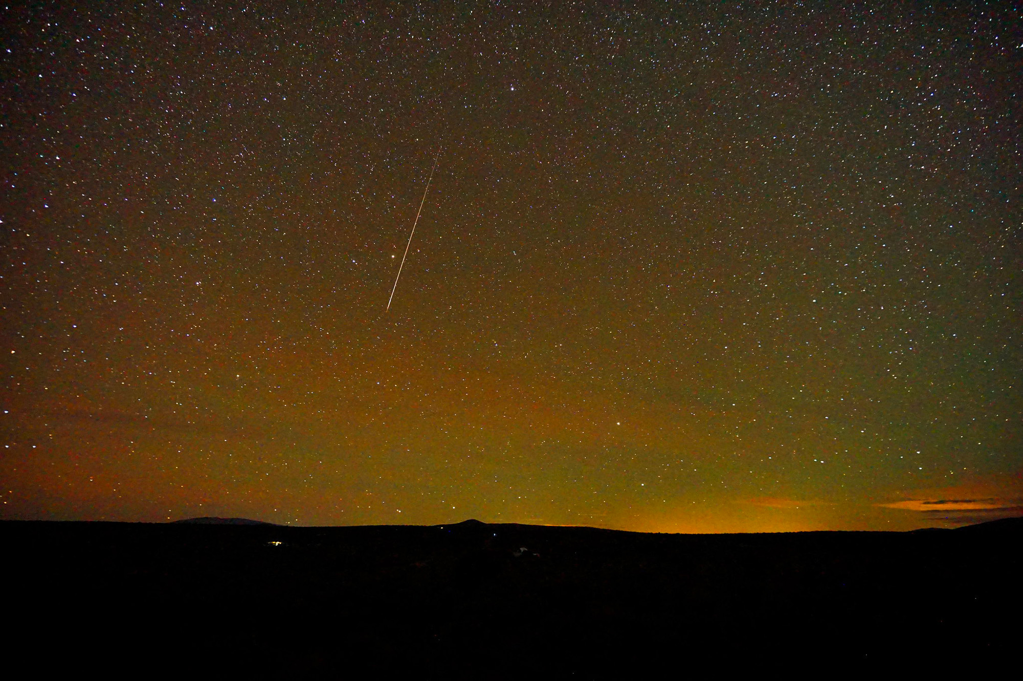 The Draconid meteor hits the starry sky over Taos, New Mexico, in this image taken by Mike Lewinsky on Oct. 5, 2018.