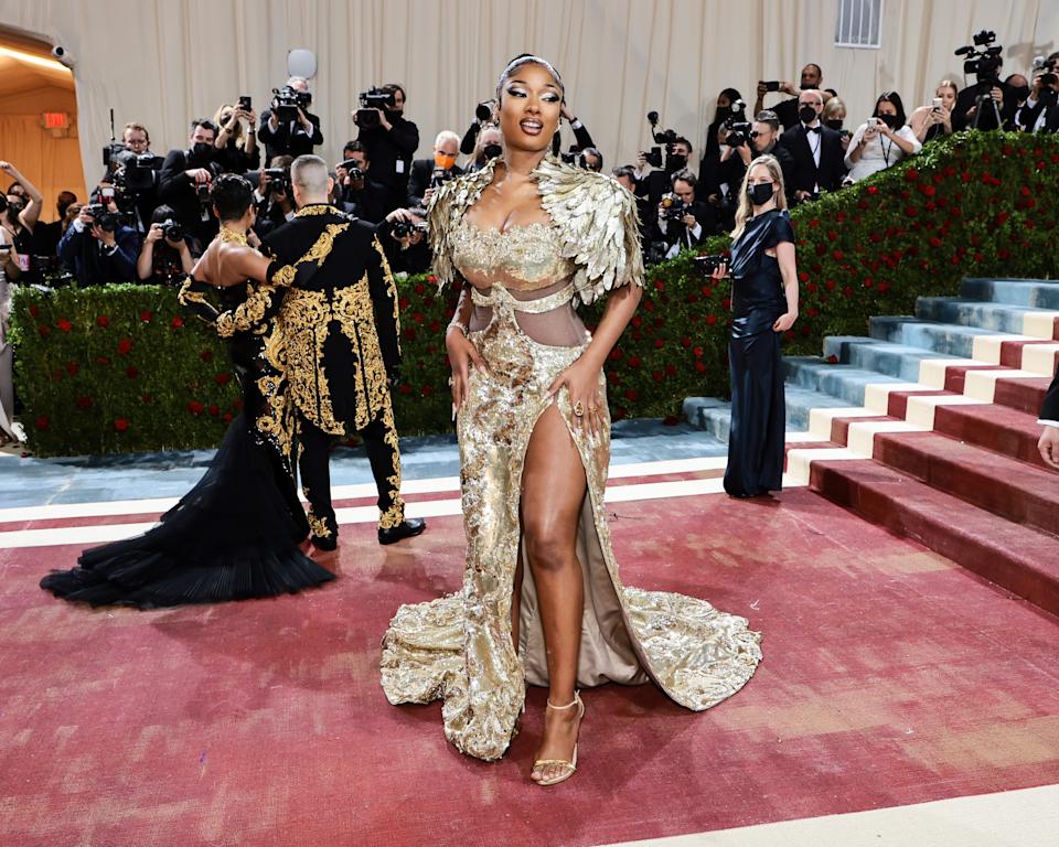 Megan Thee Stallion wears custom Moschino costumes to the 2022 Met Gala (Photo by Jimmy McCarthy/Getty Images)