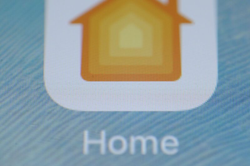 The Apple Home app appears on the iPhone screen on November 15, 2017. The Home app allows people to control accessories in their home, such as living room and kitchen lights, from their phones.